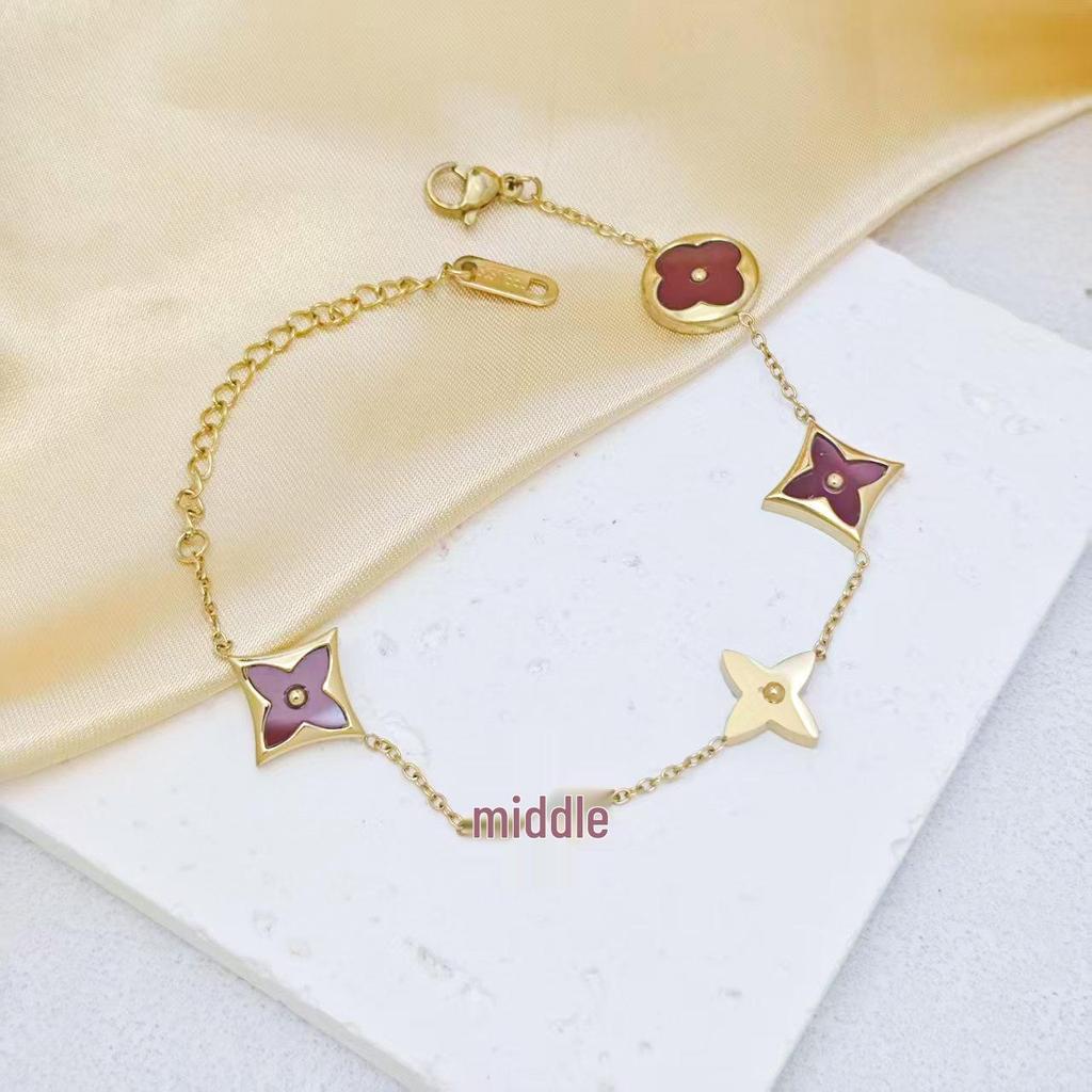 Raffinato Bracciale Quadrifoglio Guscio Bianco Acciaio di Titanio - Gioiello Elegante e Lussuoso da Donna