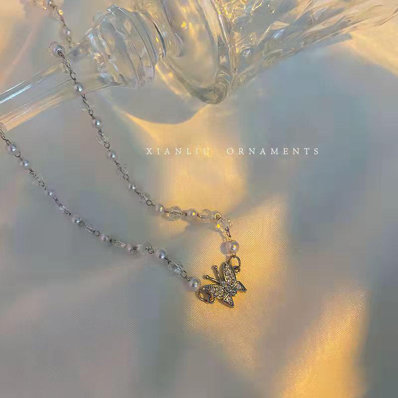 Elegant Butterfly Pearl Necklace: Light Luxury Clavicle Chain for Women