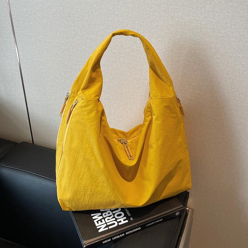 Casual soft side simple armpit bag women's large capacity light commuter tote bag ins trendy Japanese shoulder bag