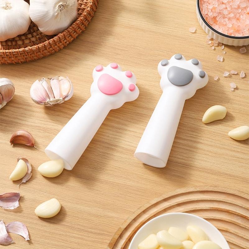 Outil Rapide Éplucheur d'Ail Avec Forme Griffe de Chat Rouleau à Éplucher Polyvalent Pour Noix Cacahuète Gadget de Cuisine