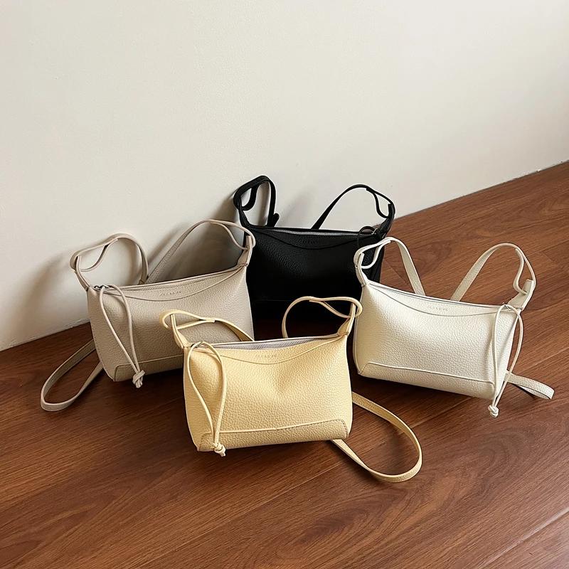 New Sense of Luxury Solid Zipper PU Pillow Shoulder Bags for Women 2026 High Quality Temperament Classic Commute Crossbody Bags