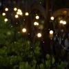 Solar Firefly Garden Lights: LED Courtyard Decor for Festive Ambiance.