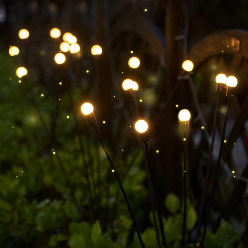 Solar Firefly Garden Lights: LED Courtyard Decor for Festive Ambiance.