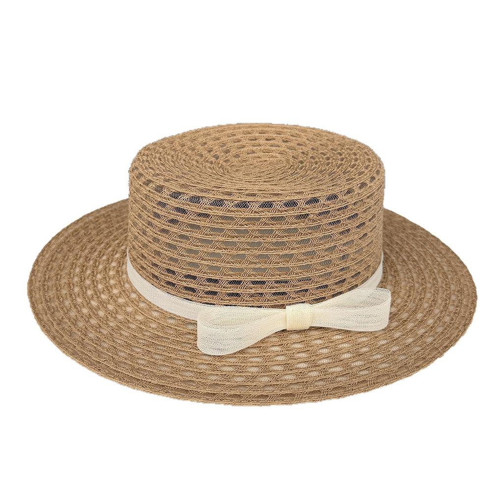 Spring and summer new hollow seaside photo hat women's beach vacation sunshade straw hat big edge flat top sunscreen top hat