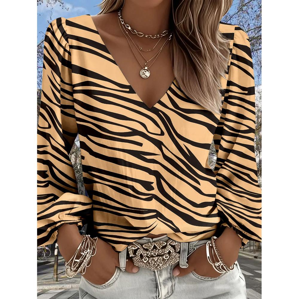 

Lady s vintage western-style printed shirt with V-neck and long sleeves featuring striped design, and Bohemian-style fringed sleeves. S