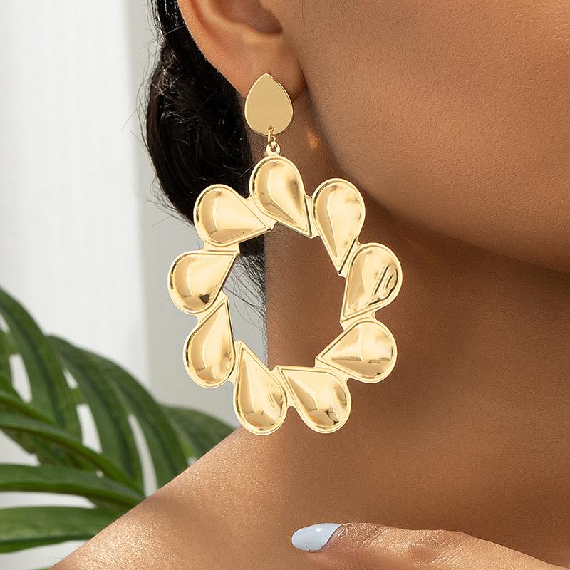 

Модні сережки-краплі для жіночих прикрас золотий