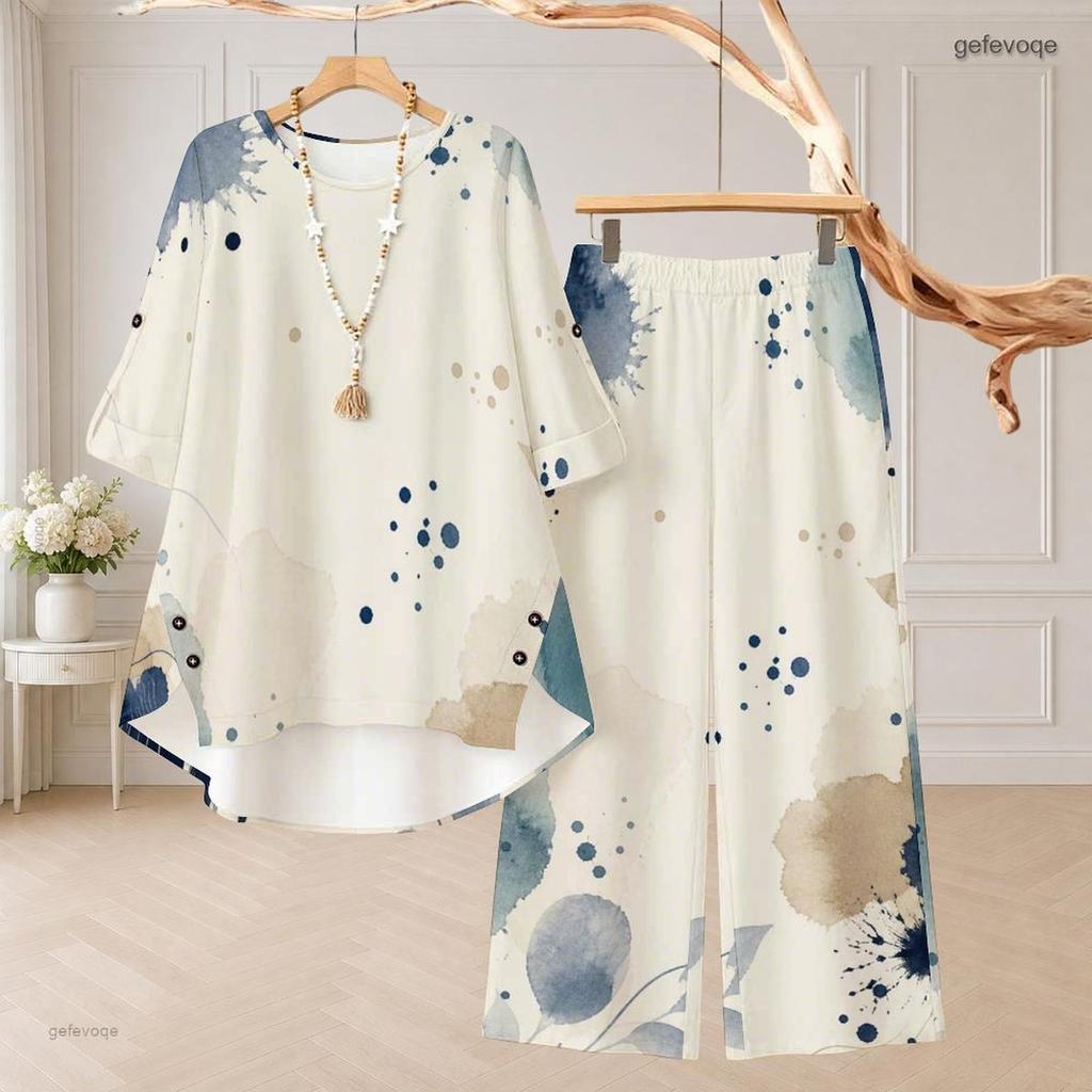 Women Plus Size White Printed Two Piece Set Round Neck Half Sleeve High Low Top Wide Leg Pants