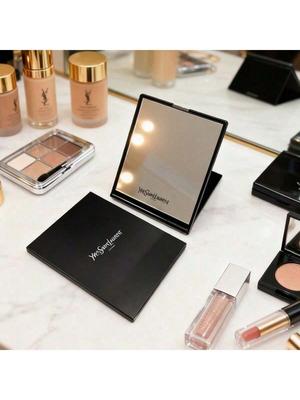 YSL Svart Hopfällbar Sminkspegel, bärbar ensidig med förvaringsfodral - Elegant och lyxig design, en perfekt överraskningspresent för kvinnor.