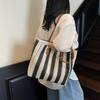 Foreign gas bag women's bag 2025 new Korean version contrasting color vertical stripe underarm tote bag fashionable shoulder bag