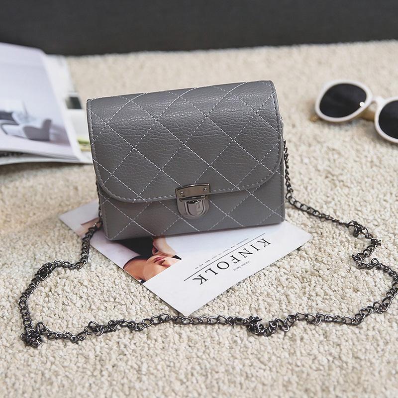 Elegant Pu Leather Female Hand Bags With Rivet Chain For Versatile Use