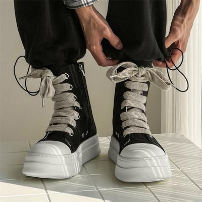 Zapatos de caña alta con suela gruesa para pareja nuevo diseño de nicho articulaciones europeas y americanas zapatos de plataforma que aumentan la altura tendencia 4848-J