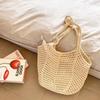 Woven bag spring autumn and winter new straw bag large capacity hollow lazy wind beach vacation shoulder women's bag