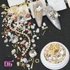 Dolphin Bay Nail Art: Shell Pieces, Rhinestones, Pearls, and Metal Chains Mixed Decorations