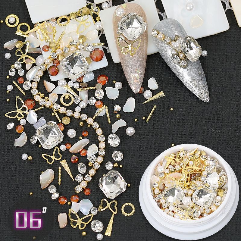 Dolphin Bay Nail Art: Shell Pieces, Rhinestones, Pearls, and Metal Chains Mixed Decorations