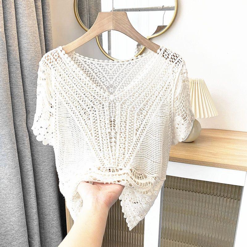 

Модель с короткими рукавами, напоминающая верхнюю одежду, свободный и ленивый стиль с V-образным вырезом, свитер тонкой вязки. One Size белый