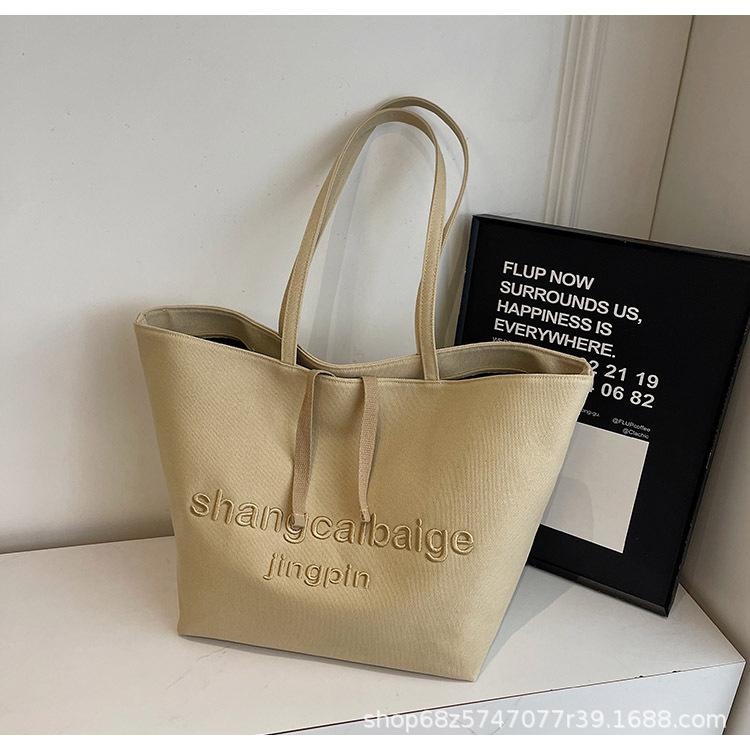 

Spring and summer shopping bags, canvas bags, shoulder bags, large bags, large capacity Korean new alphabet student ins environmentally friendly cl хаки