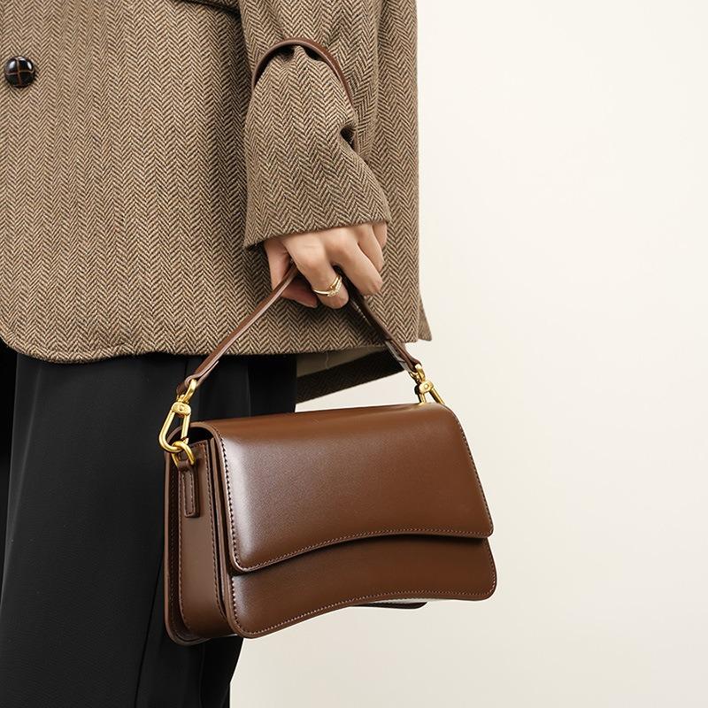 New versatile single shoulder messenger bag, cowhide high-quality niche baguette bag, high-end underarm bag, women's bag