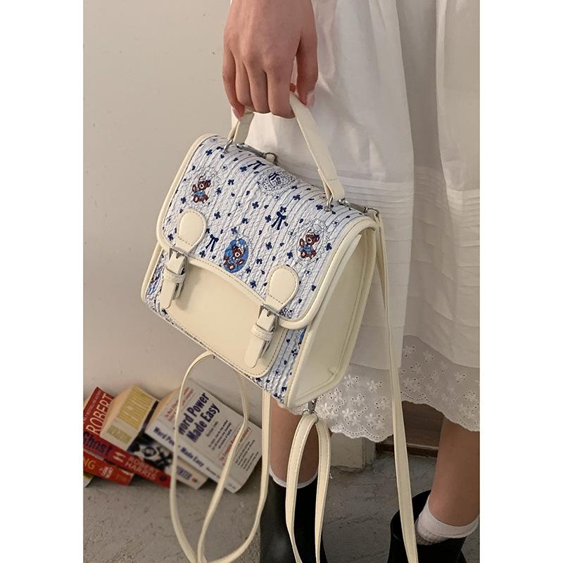 

Korean version of college style cute cartoon bear handbag women 2025 new fashion casual backpack student schoolbag