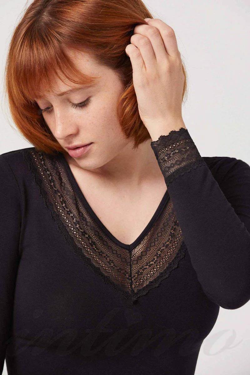 

Жіночий лонгслів Ysabel Mora (68734) 46(L) прозорий колір чорний