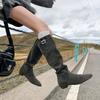 Autumn and winter new temperament versatile flat boots fashionable round head metal buckle sleeve solid color high boots