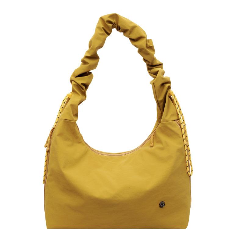 

New large-capacity women s shoulder bag, simple and elegant commuter crossbody bag, lightweight and fashiable women s nyl to жовтий