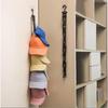 Wall-Mounted Baseball Cap Storage Hook and Hat Organizer for Wardrobe or Entryway.