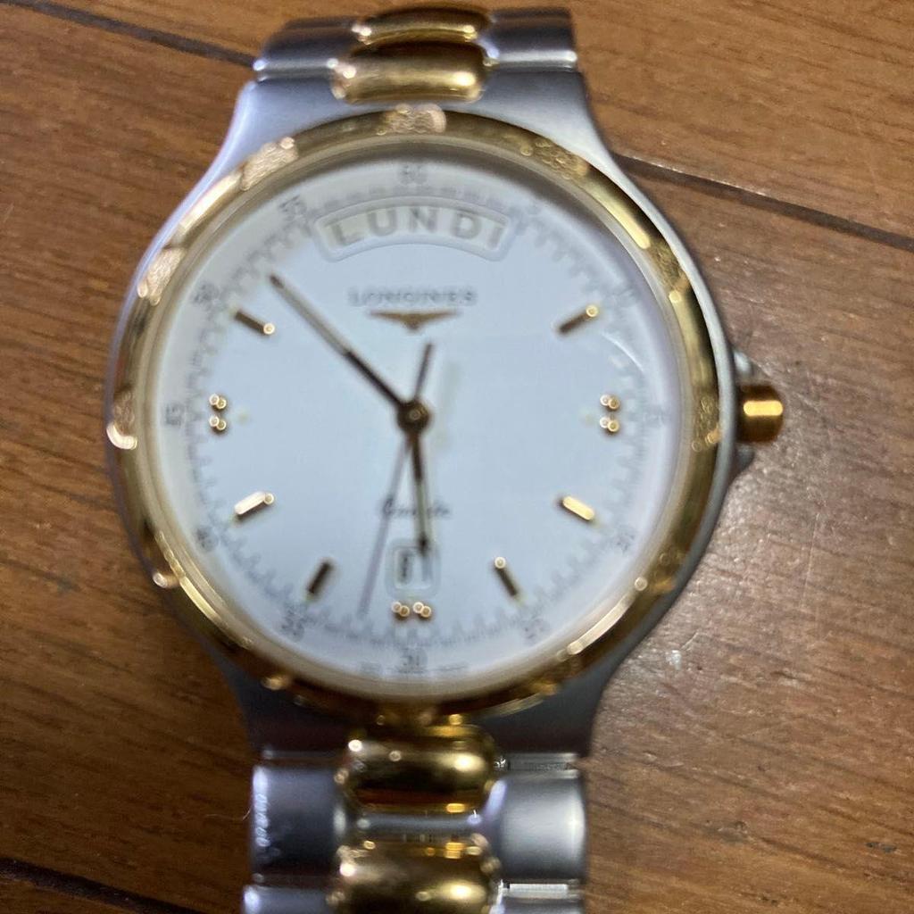 Used LONGINES quartz men's watch combination color day date (not in operation)