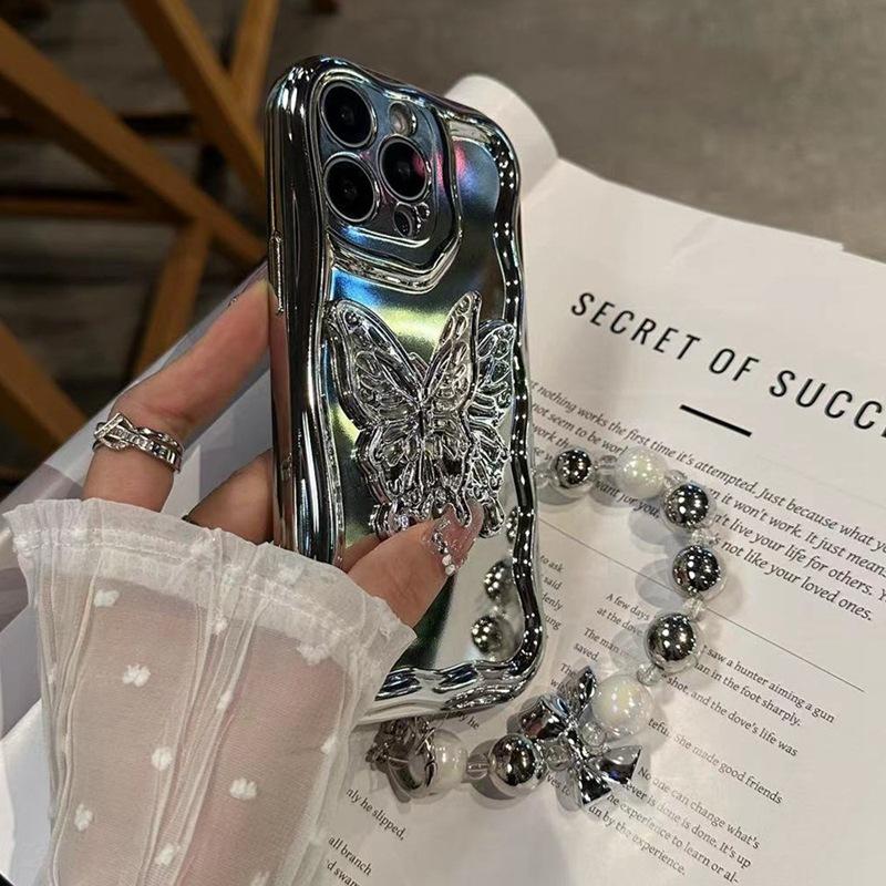 Applicable to Apple 17 mobile phone case three-dimensional silver butterfly iPhone16promax electroplating fashion style women's bracelet