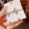 Female Summer Light Luxury Niche Twisted Earrings