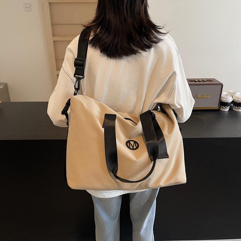 Fashion leisure travel bag, business trip, short trip out, hand bag, daily sports storage, leisure play fitness bag