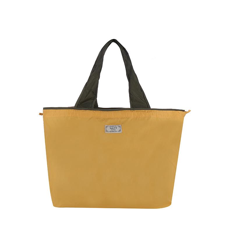 Eco-friendly Lightweight Water-repellent Foldable Shopping Bag with Drawstring Closure and Large Capacity