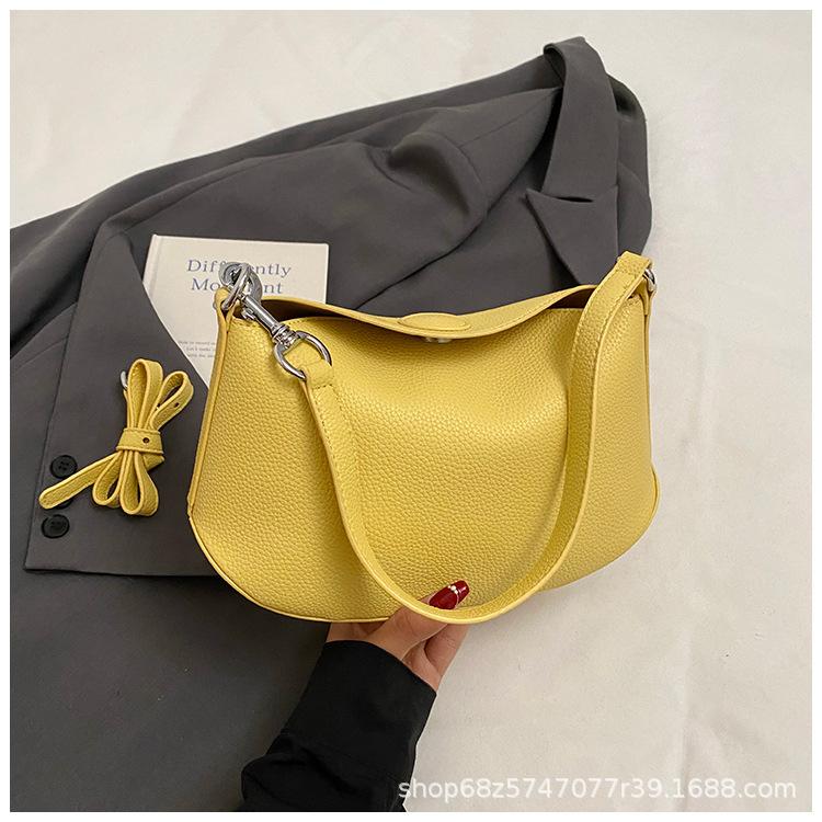 Niche design dumpling armpit bag 2025 summer new shoulder messenger bag high-end versatile lychee pattern saddle bag