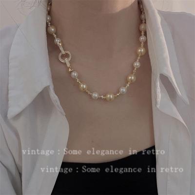 Elegantes französisches Perlen-Halsketten- und Armband-Set für Damen