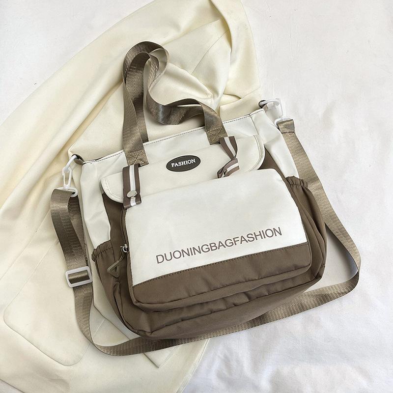 

Tote bag Carry book bag Class bag Student canvas bag Women s shoulder Japanese large-capacity beautiful tutoring bag Crossbody bag темно-коричневого кольору