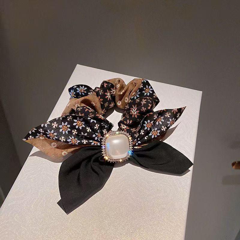 

Корейська модна гумка для волосся з перлами та стразами – Стильний та простий аксесуар