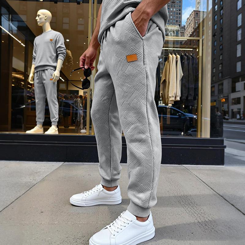Men's Loose and Simple Casual Sports Commuting Sweatpants with the Same Texture Pattern at the Counter
