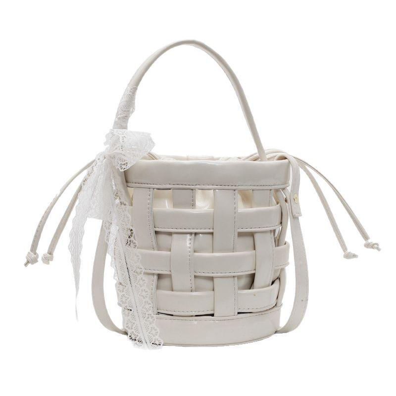 2025 Spring and Summer New Woven Niche Hand Basket Fashionable Versatile Single Shoulder Crossbody Premium Sense Commuter Bucket Bag