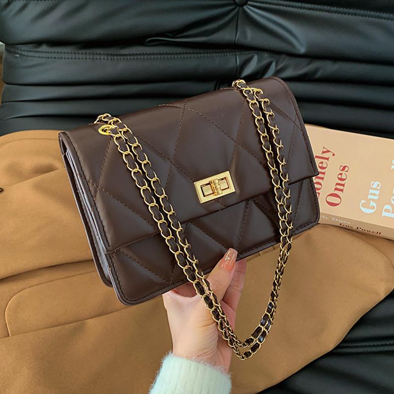 

Stylish Medium Pu Leather Shoulder Bag For Women In Trendy Winter Colors With Unique Quilted Design коричневый