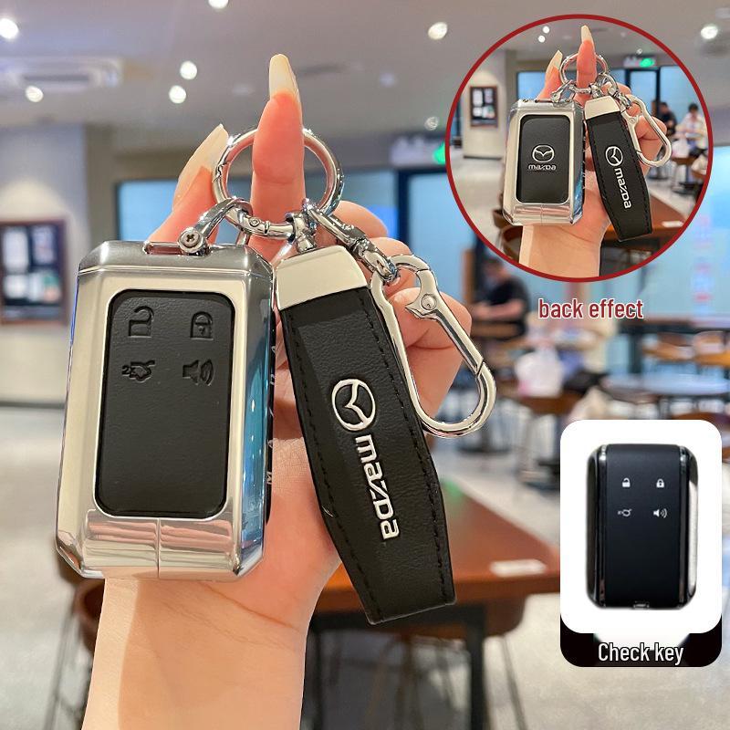 Kuooo: Wear-resistant, fully enclosed Mazda EZ6 key fob and EZ60 car remote protective cases with buckle.