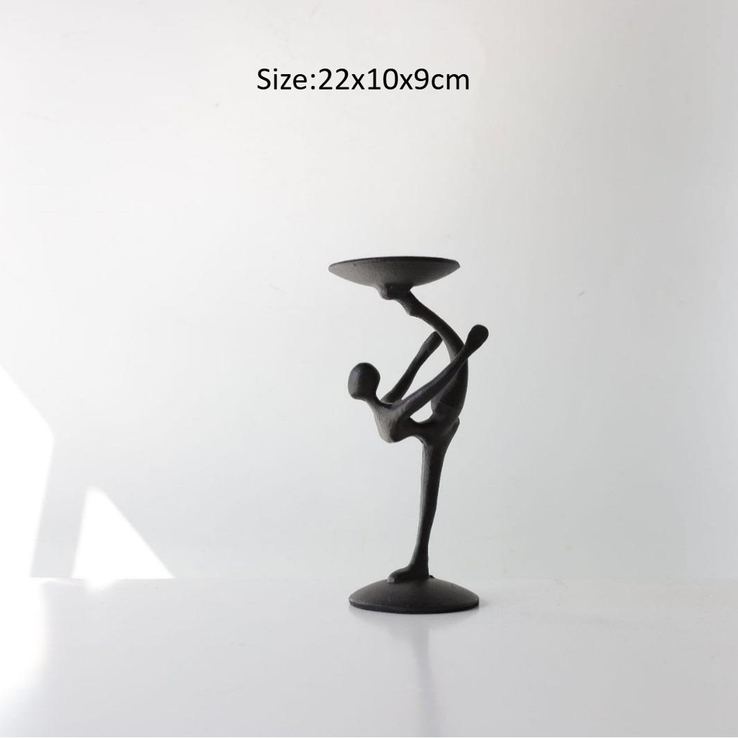 

Vintage elegant metal tabletop candle holder, suitable for weddings, anniversaries, and home and hotel decor. чорний
