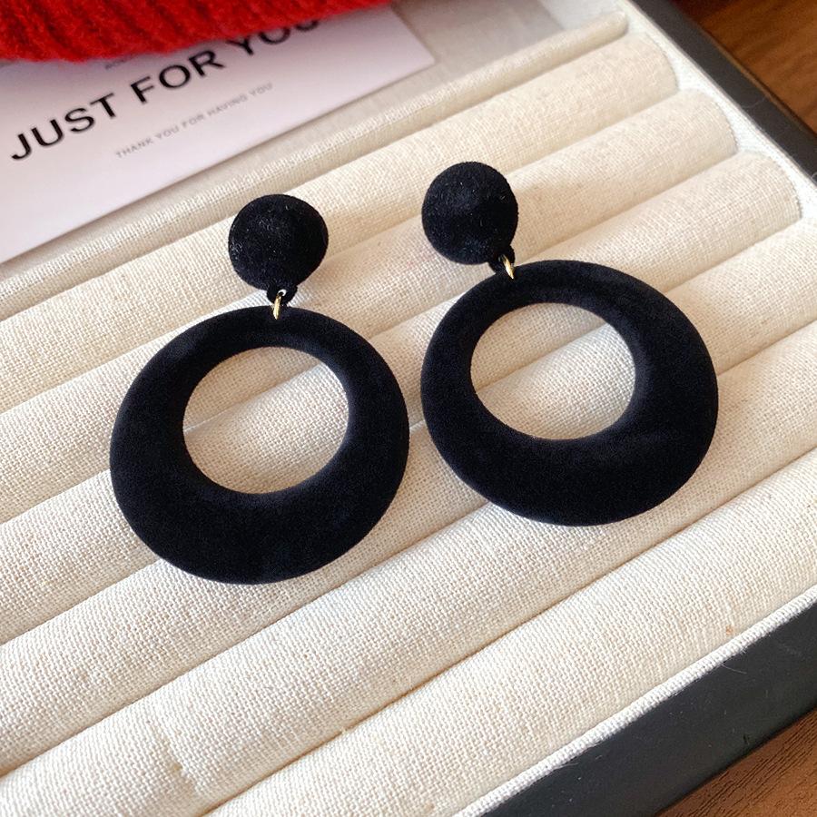 Silver needle flocking round hollow pendant earrings fashionable and simple versatile stud earrings niche high-end earrings women