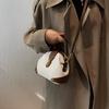 Retro Semi-round Soft Leather Rivet Corner Commuting Niche Texture Handbag