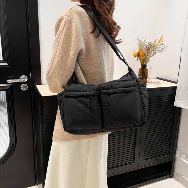 Unisex vodoodpudivá nylonová crossbody taška s více kapsami