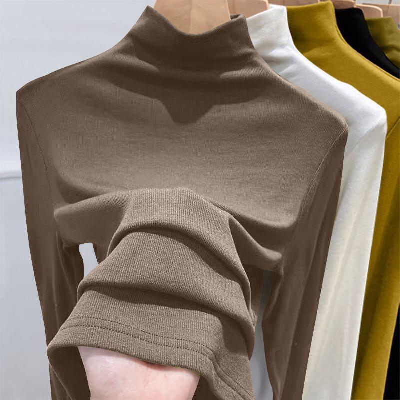 Damski prążkowany top bazowy z półgolfem, z długim rękawem. Modny na wiosnę, jesień i zimę. Dopasowany krój. Top wewnętrzny wykonany z dralonu.