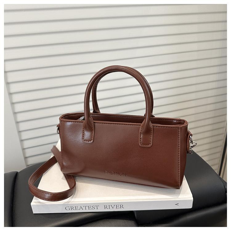 

Высококлассный темперамент Модный Универсальный и простой ручной клатч Нишевая корейская версия Сумка кроссбоди Женская маленькая квадратная сумка