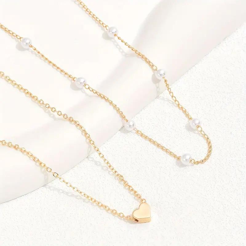 Retro Double-Layer Heart Pendant Necklace with Imitation Pearl