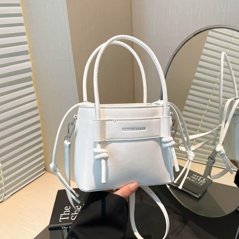 

Niche design sense portable bucket bag women s new summer simple casual shoulder messenger bag белый