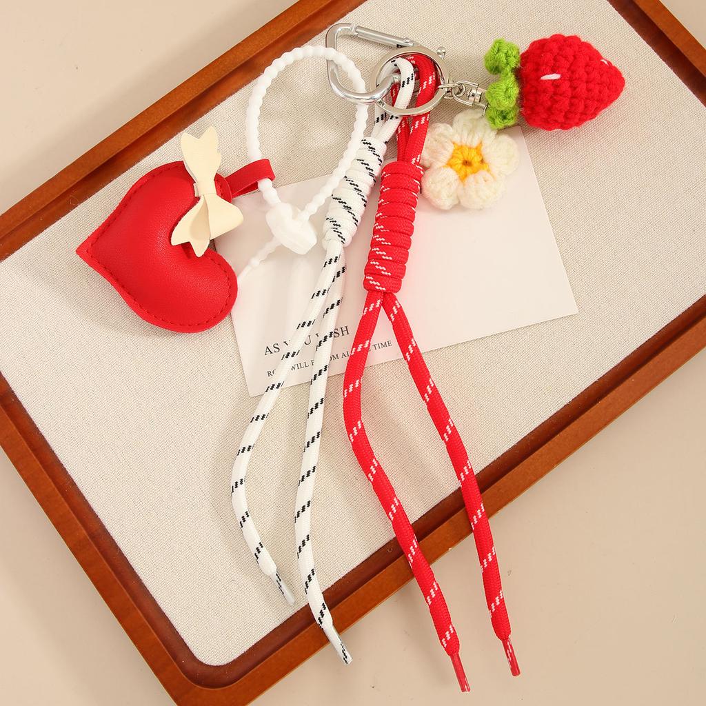 Handmade leather love bow bag hanging strawberry flower woven rope pendant keychain high sense