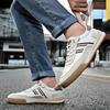 Europa Neue Schuhe für Herren Echtes Leder Freizeitschuhe Gestreifte Flache Skateboard-Schuhe Mode Slip-on Sneaker