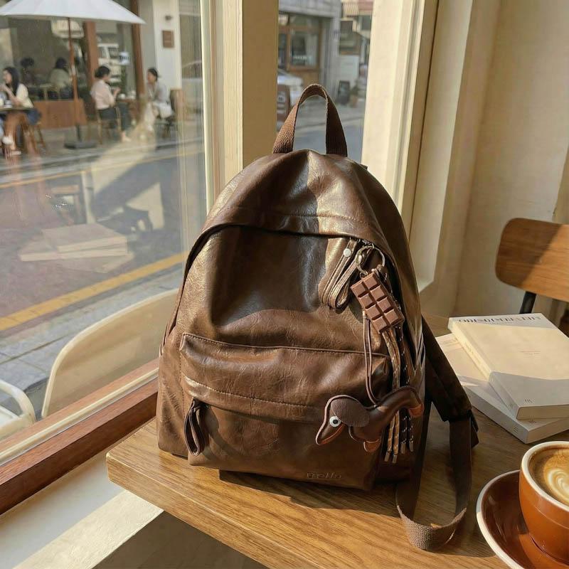 Fashionable PU Leather Backpack with Adjustable Shoulder Straps Simple Design Suitable for Daily Use Travel Shopping and Other Scenarios No Pendant